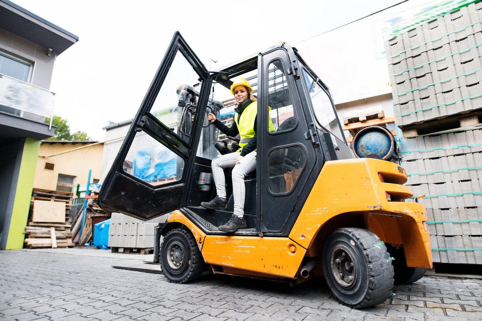 Forklift operator outside a Mussafah warehouse